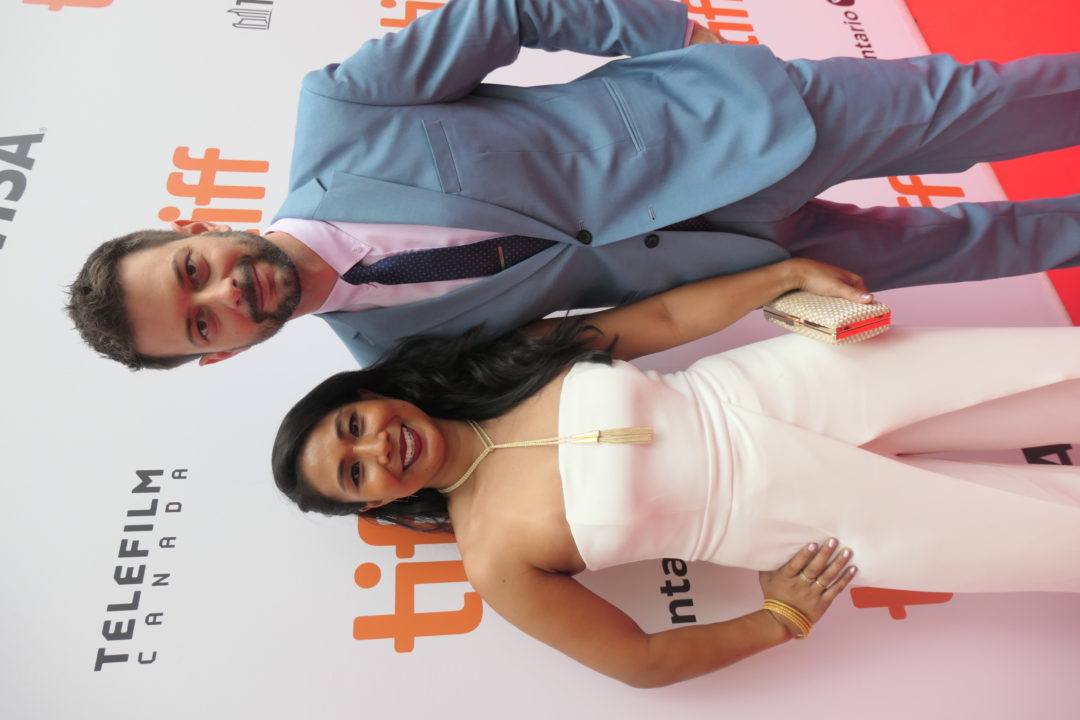 Michelle Wong and her husband at the TIFF step-and-repeat backdrop